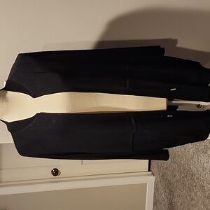 Chico's travelers black cardigan with tie waist size 12/14 length is 32 inches.